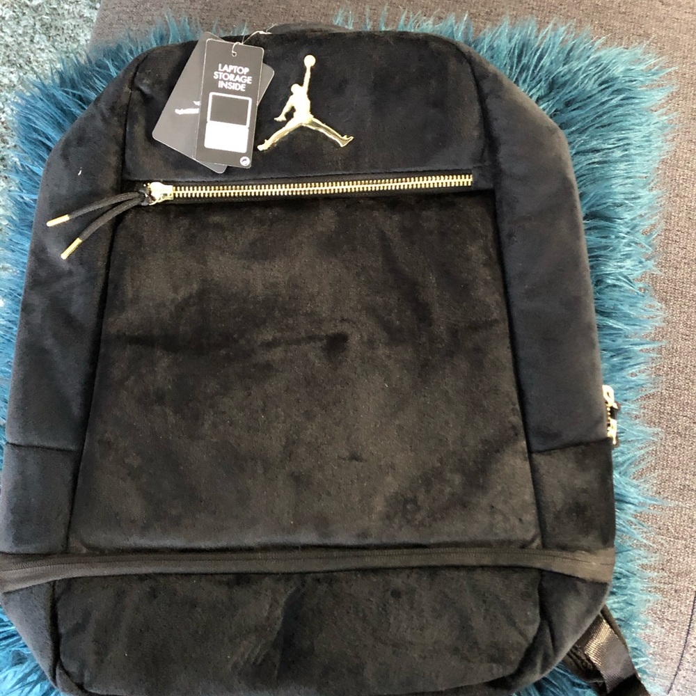 Nwt jordan backpack. Black velvet w/ gold accents